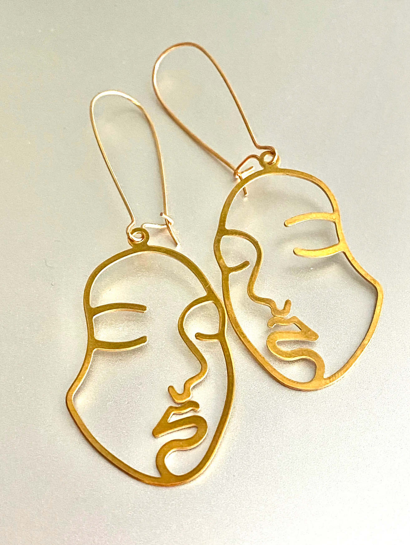 Face 2025 outline earrings